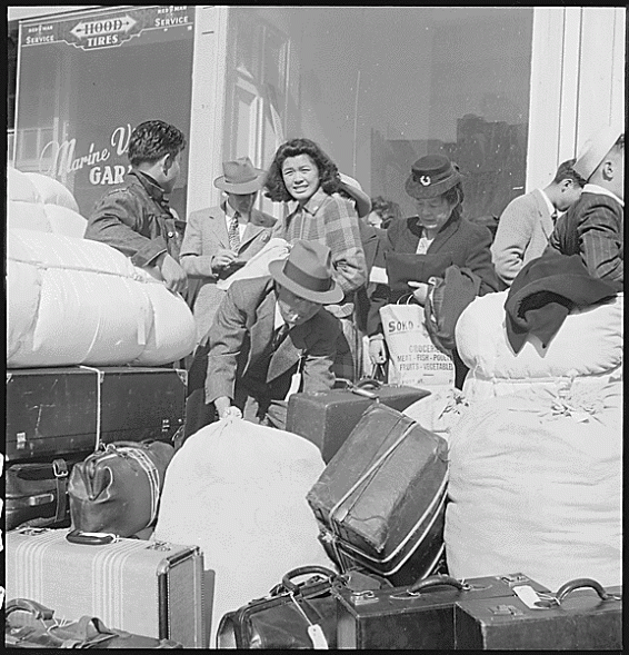 Evacuees of Japanese descent among the first 664 to be removed from San Francisco, California. April 16, 1942.
